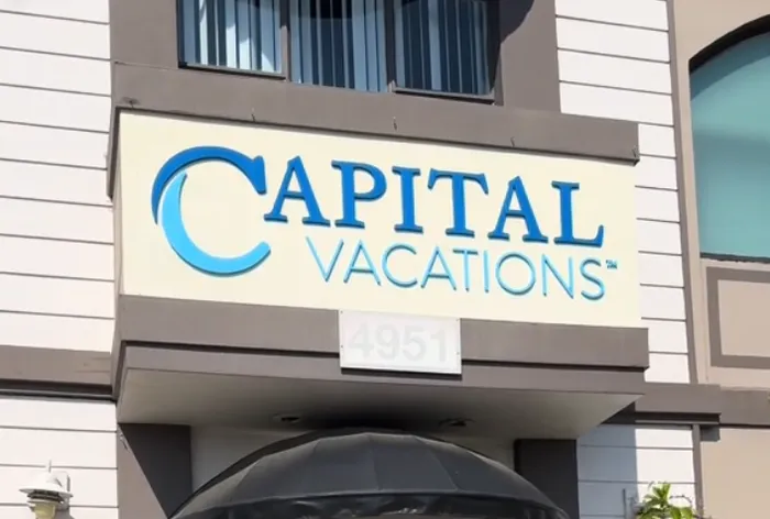 Capital Vacations' prize wheel booth at Suwanee Fest