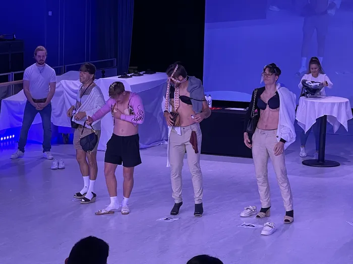 Contestant dressed up as a beauty queen during the Manliest Man Contest finale