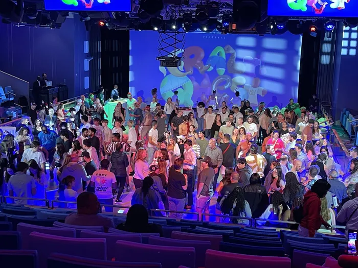 Crazy Quest crowd cheering as the event transitions into Club Red