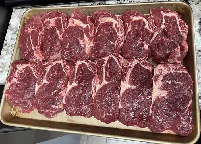 Ribeye roll sliced into 14 thinner steaks
