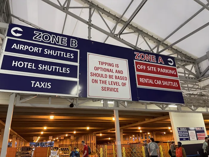 Cruise terminal signage about luggage porter services