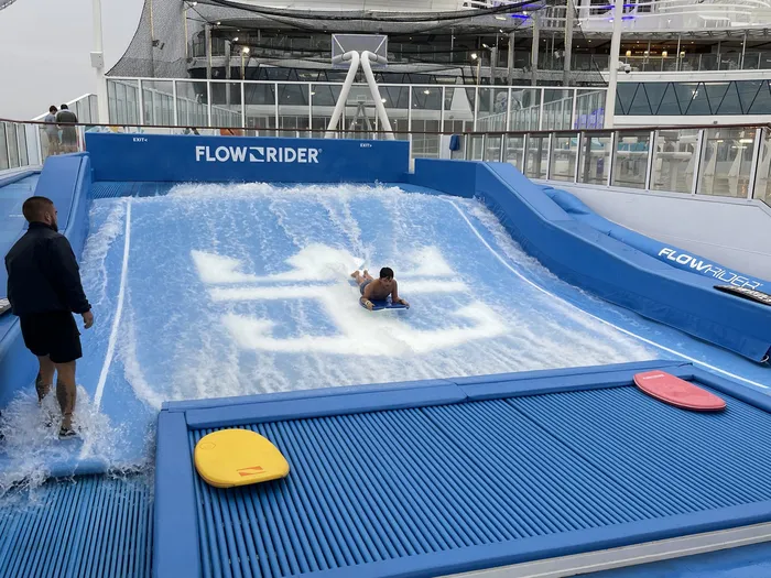 A single bodyboarder riding the FlowRider during a Mixed Wave session